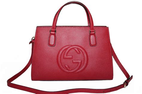 gucci soho wristlet red|Gucci mini tote bag.